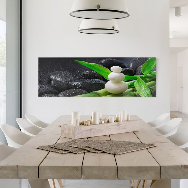 Nowoczesne obrazy do salonu Białe kamienie na bambusie
