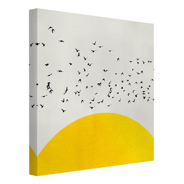 Obrazy krajobraz Stado ptaków na tle żółtego słońca