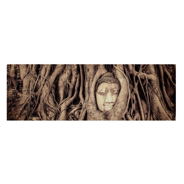 Obraz vintage Budda w Ayutthaya otoczony korzeniami drzew, czarno-biały