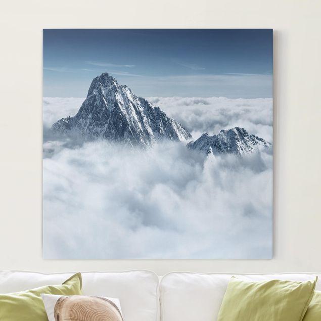 Nowoczesne obrazy do salonu Alpy ponad chmurami