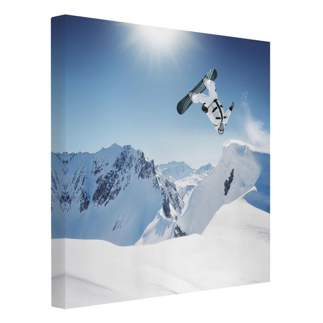Obrazy na płótnie góra Latający snowboardzista
