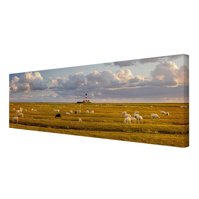 Obrazy plaża Latarnia morska na Morzu Północnym ze stadem owiec