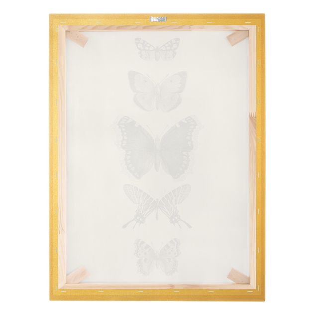 Obrazy drukowane na płótnie Motyle z atramentu na beżowym tle