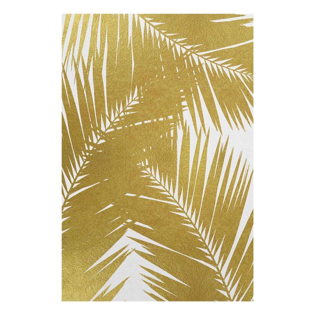 Nowoczesne obrazy Widok przez złote liście palmy