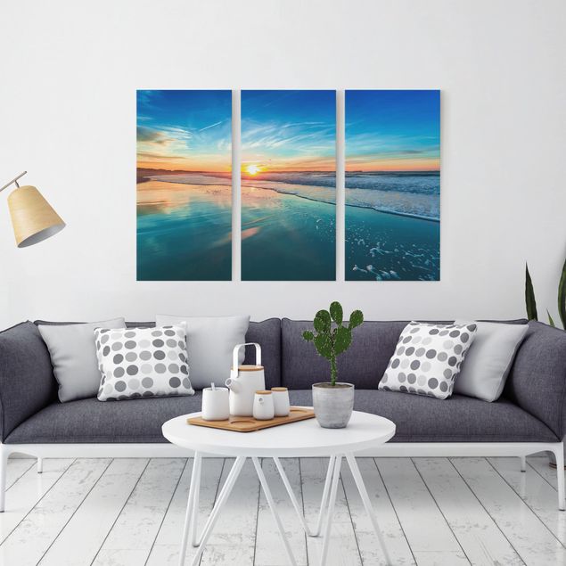 Obrazy do salonu nowoczesne Romantyczny zachód słońca nad morzem