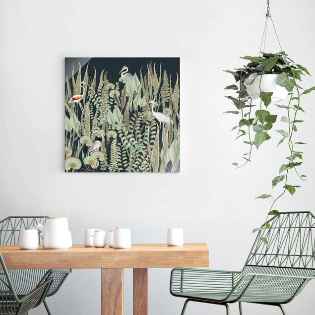 Obrazy na szkle kwadrat Flamingo i bocian z roślinami na zielonym tle