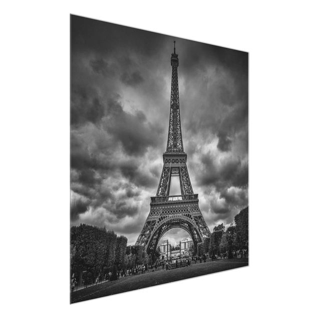 Obrazy na szkle kwadrat Wieża Eiffla na tle chmur, czarno-biała