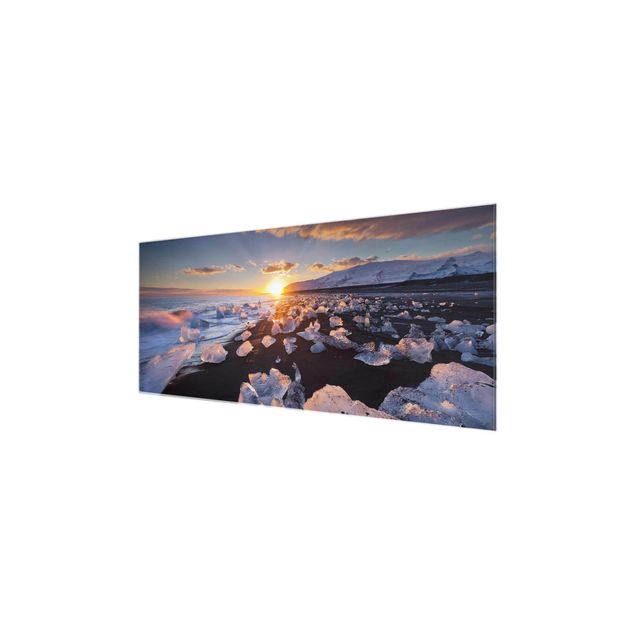 Obrazy na szkle zachód słońca Lodowe kawałki na plaży Islandia