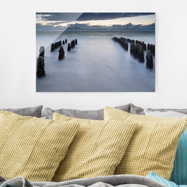 Obrazy na szkle poziomy Drewniane groty na Morzu Północnym na wyspie Sylt