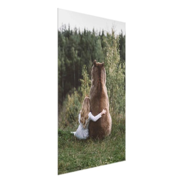 Obrazy na szkle zwierzęta Dziewczynka z niedźwiedziem brunatnym