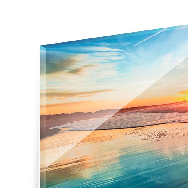 Obrazy na szkle plaża Romantyczny zachód słońca nad morzem
