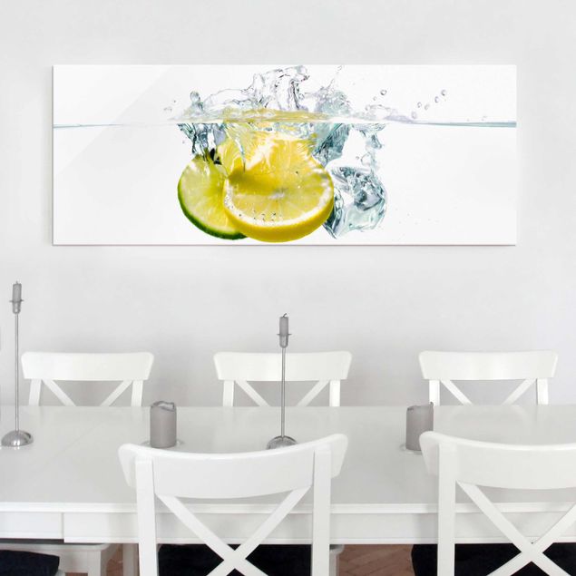 Obrazy z owocami Cytryna i limonka w wodzie