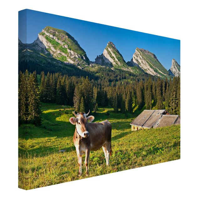 Obrazy nowoczesne Szwajcarska łąka alpejska z krową