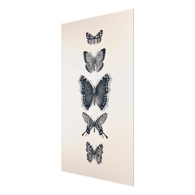 Obrazy nowoczesny Motyle z atramentu na beżowym tle