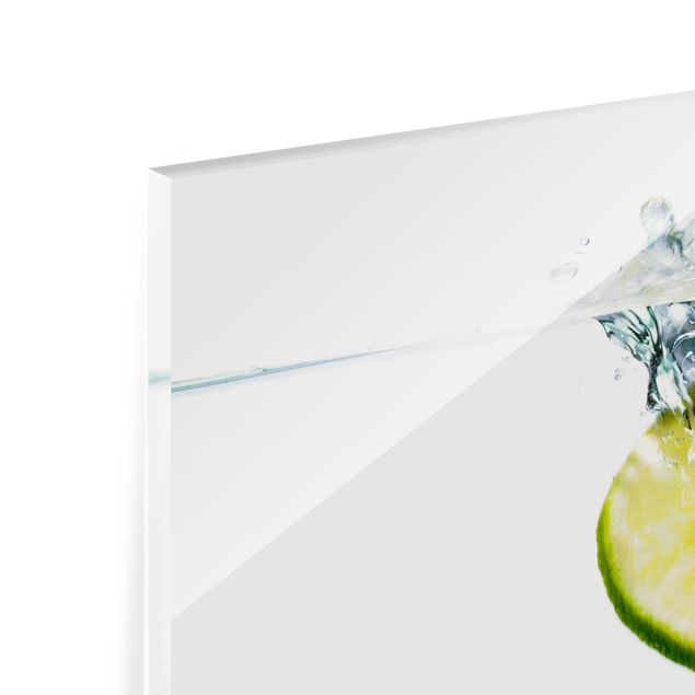 Panel szklany do kuchni - Cytryna i limonka w wodzie