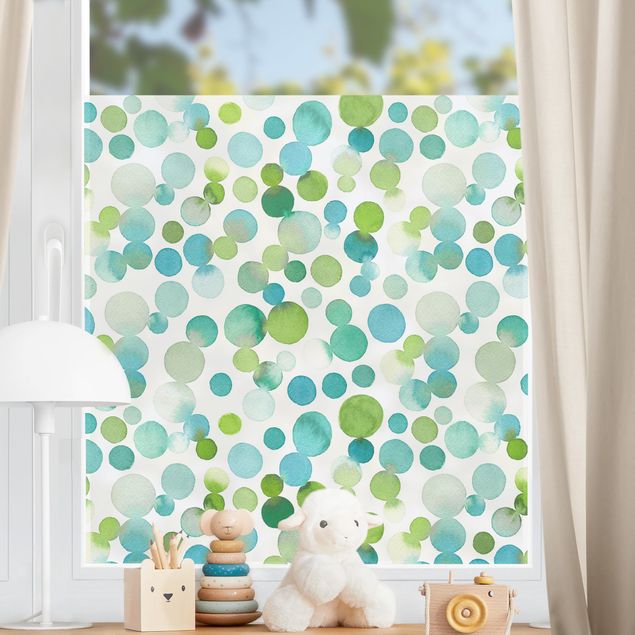 Folia okienna do salonu Akwarelowe kropki konfetti w kolorze niebiesko-zielonym