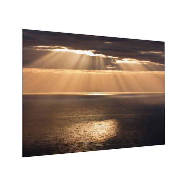 Panele szklane do kuchni Promienie słońca nad morzem