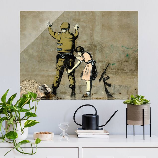 Obrazy na szkle poziomy Girl Frisking Soldier - Brandalised ft. Graffiti by Banksy