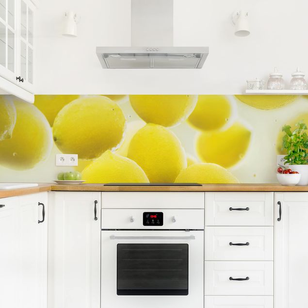 Panel szklany do kuchni Citrony w wodzie