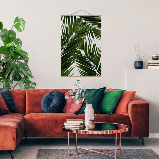 Obrazy do salonu Widok przez zielone liście palmy