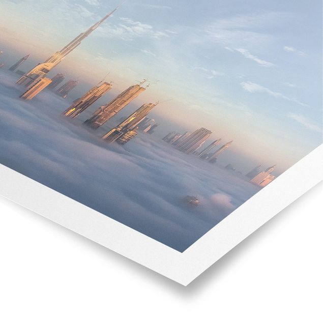 Niebieskie obrazy Dubaj ponad chmurami