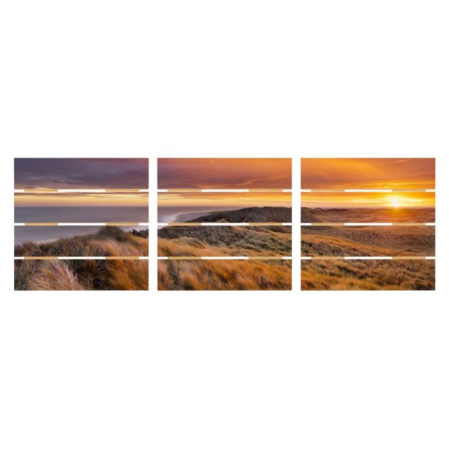 Obrazy na drewnie Wschód słońca na plaży na Sylcie