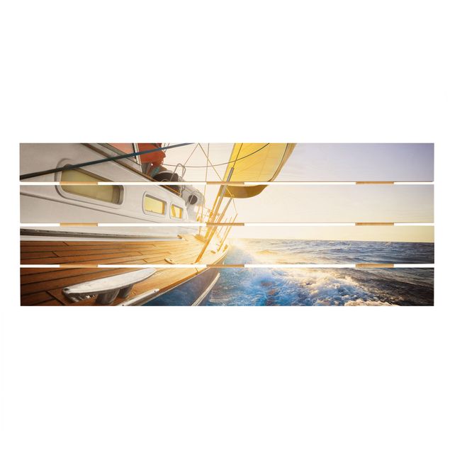 Obraz z drewna - Żaglówka na błękitnym morzu w promieniach słońca