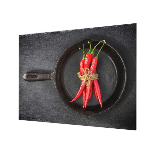 Panel szklany do kuchni - Bundle Of Red Chillies In Frying Pan On Slate