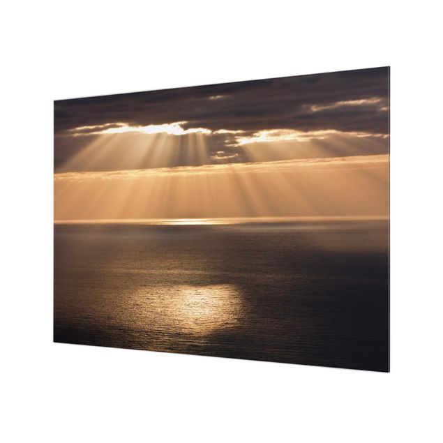 Panel szklany do kuchni - Promienie słońca nad morzem