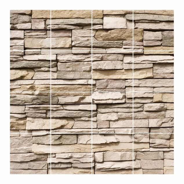 Naklejka na płytki - Asian Kamienna ściana - kamienny mur z dużych jasnych kamieni.