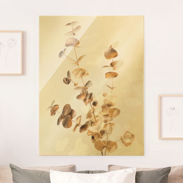 Obraz na szkle - Złote gałązki eukaliptusa z białymi liśćmi