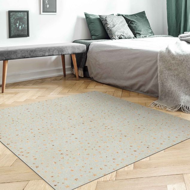 nowoczesny dywan abstrakcyjny Złote gwiazdy na jasnoniebieskim tle