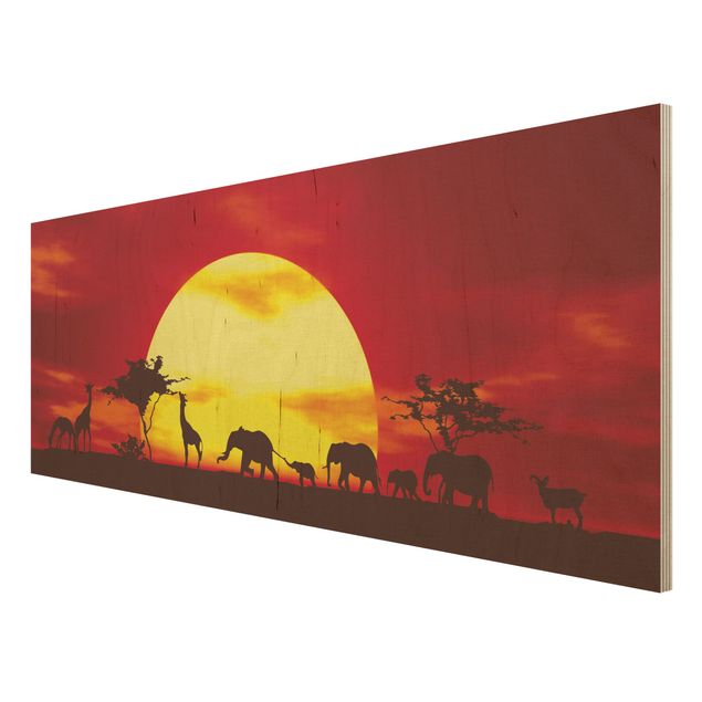 Obrazy na drewnie Karawana o zachodzie słońca