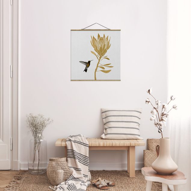 Nowoczesne obrazy do salonu Koliber i tropikalny złoty kwiat