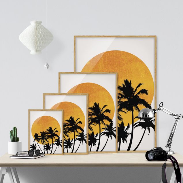 Obrazy w ramie do kuchni Palmy na tle złotego słońca