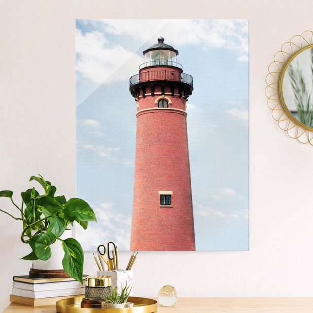 Obrazy na szkle portret Red Lighthouse On Sky Blue Backdrop