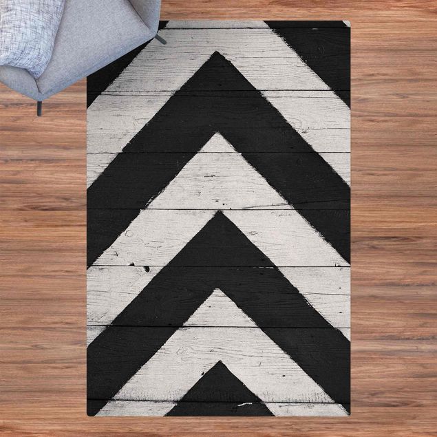 dywan nowoczesny Symetria na belce drewnianej Biały