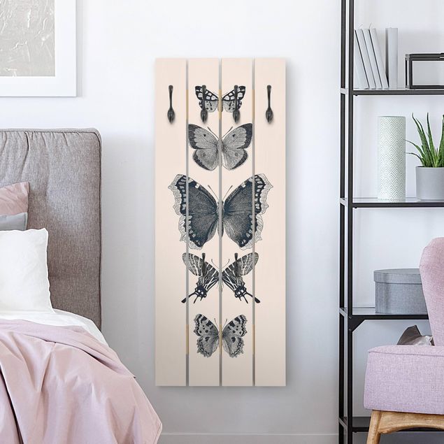 Garderoby Motyle z atramentu na beżowym tle