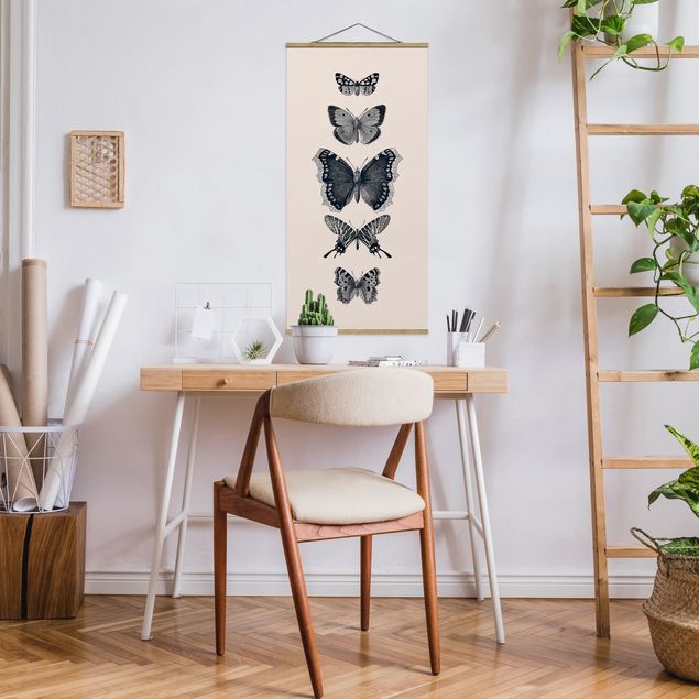 Obrazy nowoczesne Motyle z atramentu na beżowym tle
