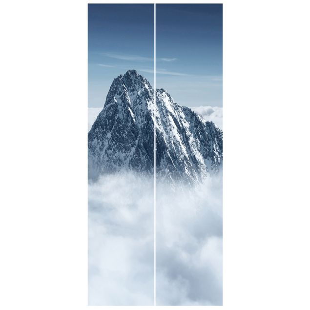 Tapeta niebieska Alpy ponad chmurami