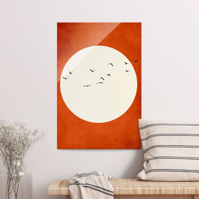 Obrazy na szkle portret Stado ptaków na tle czerwonego zachodu słońca