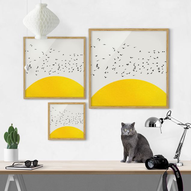 Obrazy w ramie do kuchni Stado ptaków na tle żółtego słońca